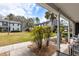 Charming view of the residential community featuring well-manicured green spaces and mature palm trees at 2494 Etiwan Ave # 12J, Charleston, SC 29414