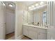 Bright bathroom featuring a double sink vanity, modern fixtures, and a separate shower area with neutral tones at 2972 Riverwood Dr, Mount Pleasant, SC 29466