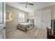 Cozy bedroom with light carpet, baseball decor, and a large closet at 2972 Riverwood Dr, Mount Pleasant, SC 29466
