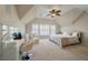 Bright bedroom featuring a ceiling fan, a large bed, a white vanity, three windows, and neutral tones at 2972 Riverwood Dr, Mount Pleasant, SC 29466