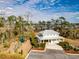 View of the community center that includes a playset, covered parking, and outdoor gathering space with waterfront views at 2972 Riverwood Dr, Mount Pleasant, SC 29466