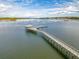 Aerial view of the community dock featuring a covered gazebo with boat slips for easy water access and enjoyment at 2972 Riverwood Dr, Mount Pleasant, SC 29466