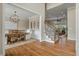 Open-concept dining room with wood table, chairs, chandelier, and views into living room at 2972 Riverwood Dr, Mount Pleasant, SC 29466