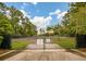 Community entrance gate with 'Members Only' signage surrounded by mature trees at 2972 Riverwood Dr, Mount Pleasant, SC 29466