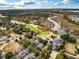 Aerial view of the golf course, clubhouse, and marsh in the community at 2972 Riverwood Dr, Mount Pleasant, SC 29466