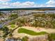 Aerial view of the golf course and surrounding marsh with neighborhood homes at 2972 Riverwood Dr, Mount Pleasant, SC 29466