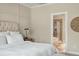 Relaxing bedroom with an adjacent bathroom featuring a separate shower and soaking tub at 2972 Riverwood Dr, Mount Pleasant, SC 29466