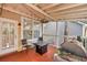 Covered back porch featuring a grill, seating, ceiling fan, and string lights at 3009 Macbeth Creek Dr, Charleston, SC 29414