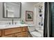 Bathroom featuring a marble countertop, wooden vanity, and a shower over tub at 3009 Macbeth Creek Dr, Charleston, SC 29414