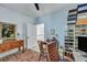 This bedroom features a wooden desk, natural light, and a shelf for storing shoes at 3009 Macbeth Creek Dr, Charleston, SC 29414