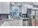 Bright kitchen with granite countertops, stainless steel appliances, and a sink with window view at 3009 Macbeth Creek Dr, Charleston, SC 29414