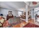 Elegant living room with hardwood floors, area rug, stylish furniture, and staircase access at 3009 Macbeth Creek Dr, Charleston, SC 29414