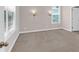 Neutral bedroom with sconces and carpet at 3042 Moonlight Dr, Charleston, SC 29414