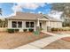 Charming community clubhouse featuring stone accents, manicured landscaping, and neutral exterior color palette at 3042 Moonlight Dr, Charleston, SC 29414