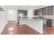 Modern kitchen with granite countertops, stainless steel appliances, and a large island at 3042 Moonlight Dr, Charleston, SC 29414