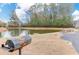 Enjoy outdoor living with a large pond, grill, and picnic tables at 3042 Moonlight Dr, Charleston, SC 29414