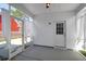 Cozy screened porch with white paneling at 3042 Moonlight Dr, Charleston, SC 29414