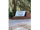 Welcome to McClellanville sign surrounded by beautiful lush green vegetation at 3102 Hailey Ct, McClellanville, SC 29458