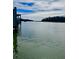 Picturesque waterfront view featuring calm waters, lush greenery, and tranquil scenery at 3102 Hailey Ct, McClellanville, SC 29458