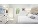 Comfortable bedroom featuring a large bed, dresser, and natural light from the window at 315 Pine Crest View Dr, Summerville, SC 29486