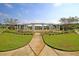 Inviting community green space with lawn, landscaping and shade trees at 315 Pine Crest View Dr, Summerville, SC 29486