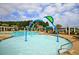 Community pool featuring a zero entry access, playground features and seating areas at 315 Pine Crest View Dr, Summerville, SC 29486