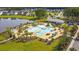 Aerial view of a community pool with pergolas, zero entry, and a splash pad at 315 Pine Crest View Dr, Summerville, SC 29486