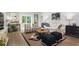 Bright living room with stylish furniture, hardwood floors, and large sliding glass doors at 315 Pine Crest View Dr, Summerville, SC 29486