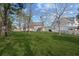Spacious backyard with a view of the home and surrounding trees, perfect for outdoor enjoyment at 315 Sabal Palmetto Ct, Moncks Corner, SC 29461