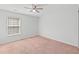 Bedroom featuring a ceiling fan, a window, plush carpet, and a contemporary design at 315 Sabal Palmetto Ct, Moncks Corner, SC 29461