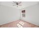 Inviting bedroom with a ceiling fan, window with blinds, and plush carpet at 315 Sabal Palmetto Ct, Moncks Corner, SC 29461