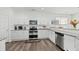 Contemporary kitchen featuring white cabinets, stainless appliances, and modern countertops at 315 Sabal Palmetto Ct, Moncks Corner, SC 29461