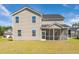 Backyard featuring a screened-in porch, manicured lawn, and siding on the house at 330 Pine Crest View Dr, Summerville, SC 29486