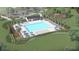 Aerial view of a community pool area, with lounge chairs and tropical landscaping at 330 Pine Crest View Dr, Summerville, SC 29486