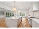 Kitchen with a large island, professional range, and access to deck at 3897 Summerton St, Mount Pleasant, SC 29466