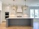 This modern kitchen is equipped with stainless steel appliances, custom cabinets, and a center island at 3897 Summerton St, Mount Pleasant, SC 29466