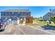 Backyard view shows a wood privacy fence and wooden screen, providing a secluded outdoor space at 3941 Four Poles Park Dr, North Charleston, SC 29405