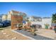 Cozy backyard patio features a modern privacy screen, comfortable seating, and string lights for outdoor entertaining at 3941 Four Poles Park Dr, North Charleston, SC 29405