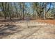 Disc golf basket in a wooded park setting, ready for a round of outdoor fun and recreation at 3941 Four Poles Park Dr, North Charleston, SC 29405