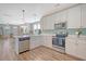 Spacious kitchen featuring stainless steel appliances, quartz countertop island, and open concept layout at 3941 Four Poles Park Dr, North Charleston, SC 29405