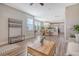Open-concept living space with hardwood floors, dining area, and modern kitchen at 3941 Four Poles Park Dr, North Charleston, SC 29405