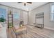 Cozy living room with hardwood floors, bright windows, and modern furniture at 3941 Four Poles Park Dr, North Charleston, SC 29405