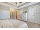 Large main bedroom with a chest of drawers, double closets, and attached bathroom at 3941 Four Poles Park Dr, North Charleston, SC 29405