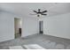 Open bedroom view features neutral carpet, ceiling fan and fresh paint at 429 Cherrybark Oak St, Summerville, SC 29486