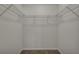 Walk-in closet features wire shelving and neutral carpet at 429 Cherrybark Oak St, Summerville, SC 29486