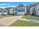 Charming two-story home with a spacious two-car garage and a well-manicured front yard at 429 Cherrybark Oak St, Summerville, SC 29486
