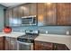 Well-equipped kitchen with stainless steel microwave and gas range for cooking enthusiasts at 429 Cherrybark Oak St, Summerville, SC 29486