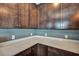 Kitchen with bright countertops and wooden cabinets and drawers at 429 Cherrybark Oak St, Summerville, SC 29486