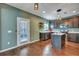 Eat-in kitchen featuring stainless steel appliances, wooden cabinets, and hardwood floors at 429 Cherrybark Oak St, Summerville, SC 29486