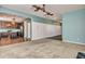 Open-concept living space featuring carpet, views of the kitchen, and modern finishes at 429 Cherrybark Oak St, Summerville, SC 29486